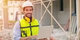 Smiling construction manager because he's saving money with gps fleet tracking