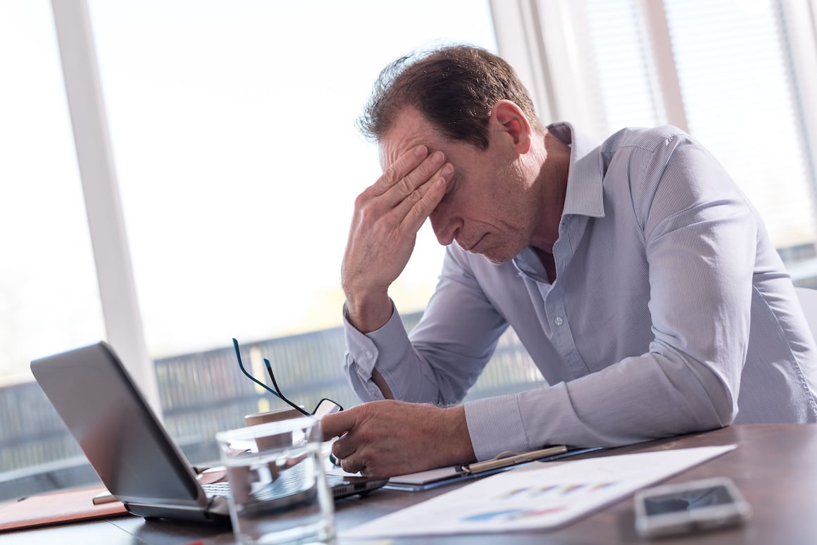 Stressed HVAC business owner trying to grow his business without GPS fleet tracking