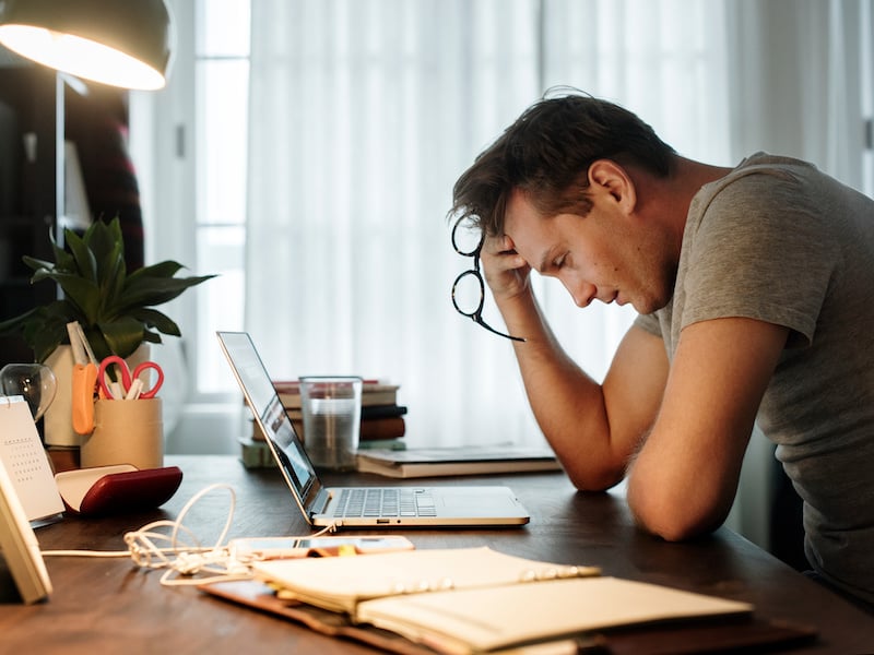 Stressed landscaping business owner managing company struggles