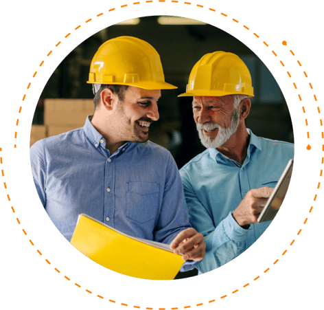 Two construction workers reviewing plans